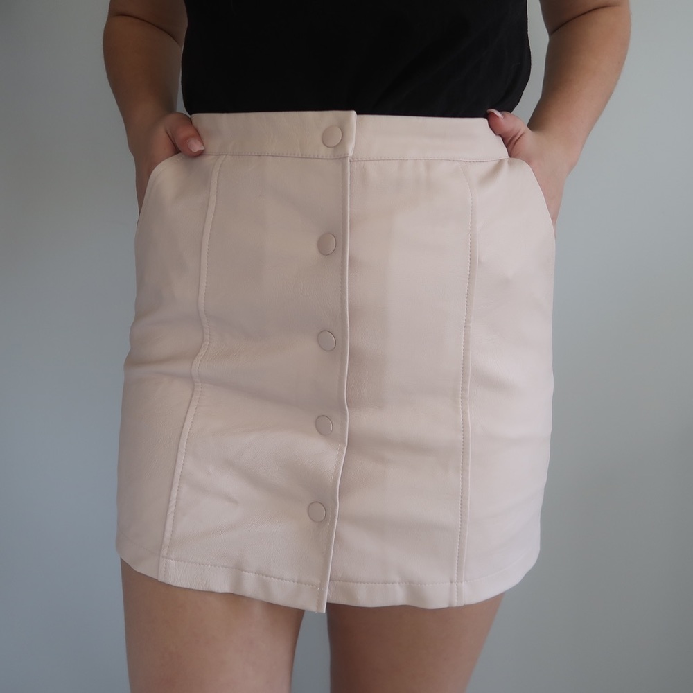 pink leather button up skirt